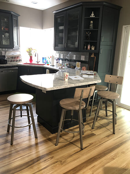 Amisco's Architect Swivel Barstools with Wood Seats and Metal Frame in Transitional Kitchen