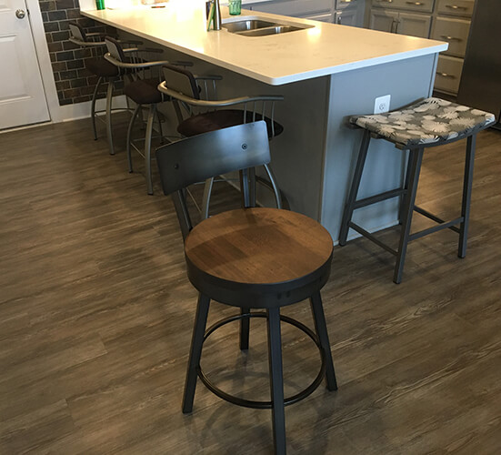 Amisco's Lauren Swivel Bar Stools with Metal Back and Wood Seat in Kitchen