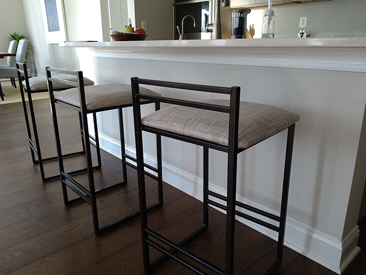 Amisco's Sonoma Modern Brown Metal Barstool with Low Back and Fabric Cushion in Modern Kitchen