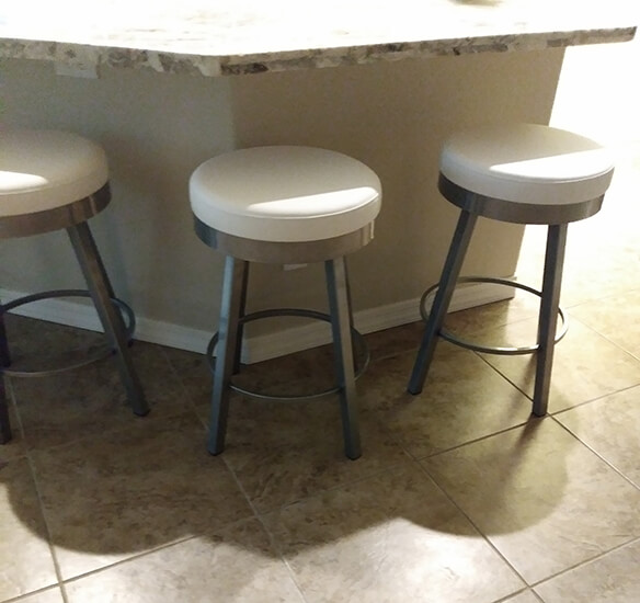 Amisco's Rudy Backless Swivel Counter Stools in Silver and White in Kitchen